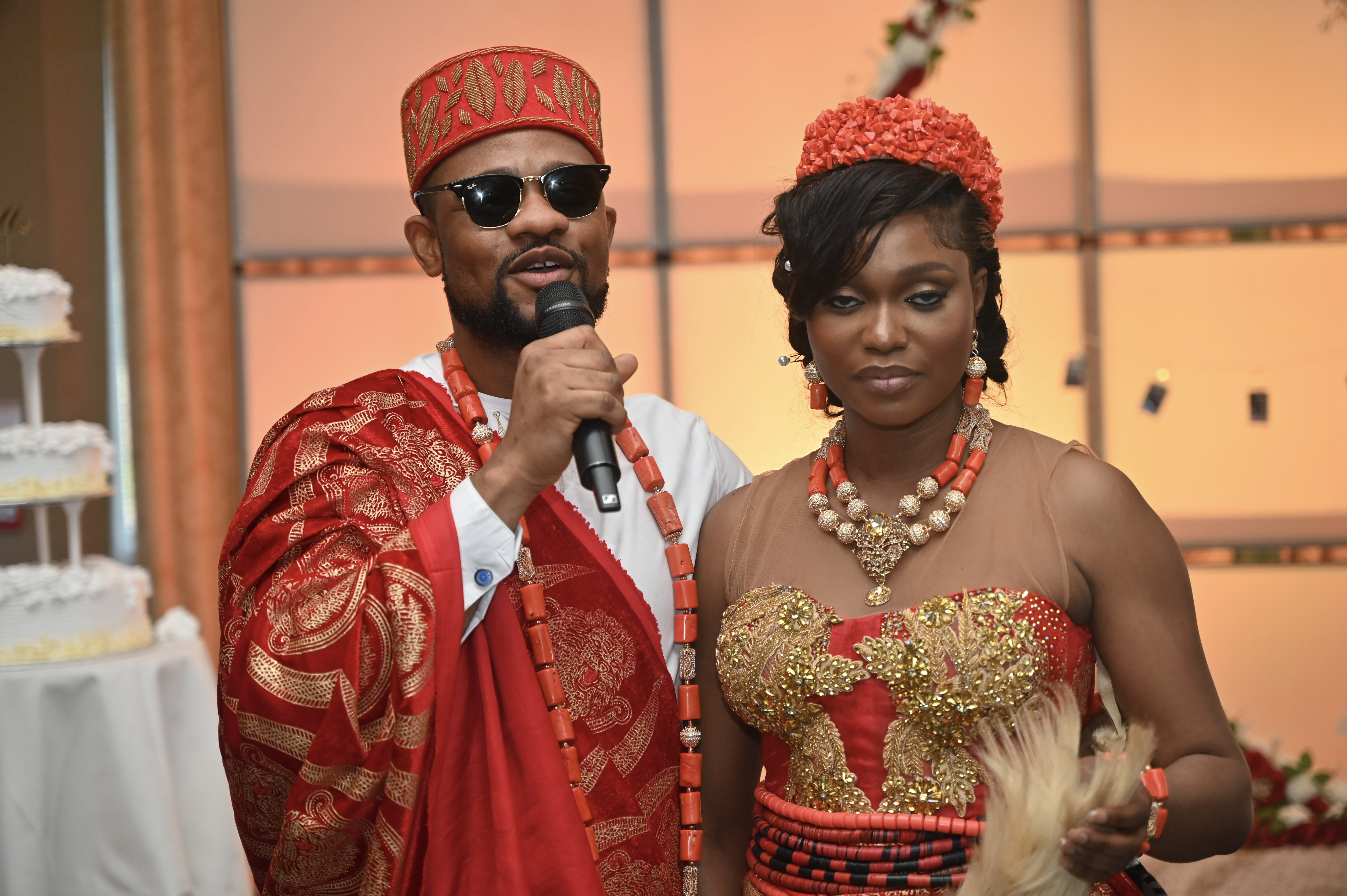 Wedding couple holding hands with flowers